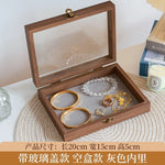 boîtes bijoux bois marron foncé verre transparent compartiments velours gris classique moderne femmes festival