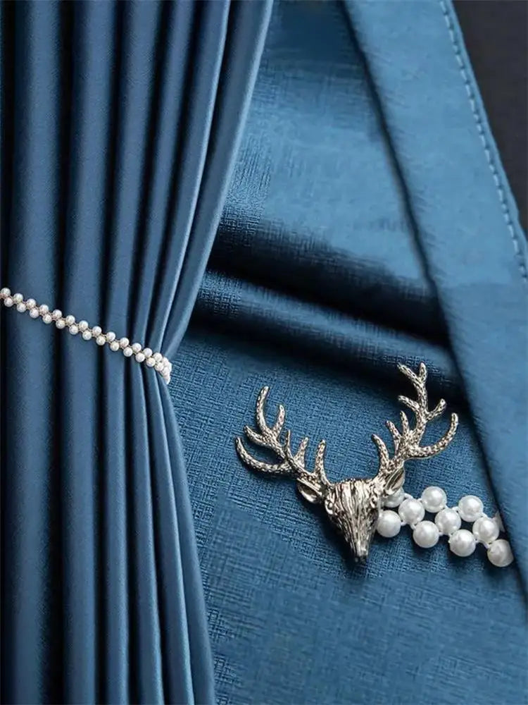 accessoires fenêtre élégants tête cerf dorées fixations rideaux vintage decoration