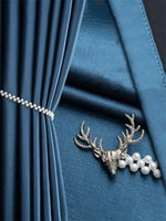accessoires fenêtre élégants tête cerf dorées fixations rideaux vintage decoration
