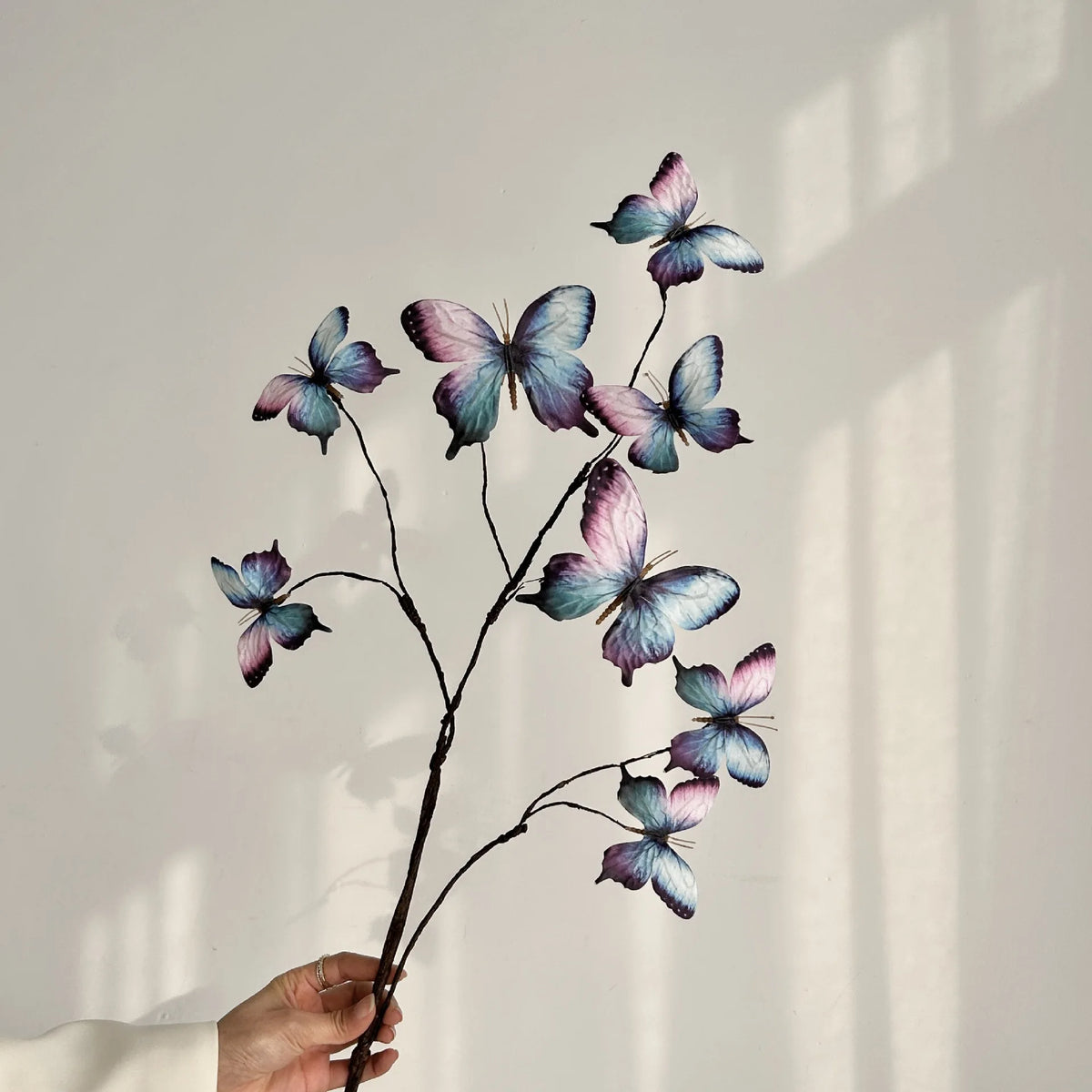 décoration intérieure branche artificielle papillons bleu violet branches naturelles maison mariage anniversaire