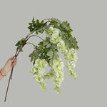 décoration intérieure guirlande fleurs artificielles bleu blanc rose vert naturel