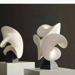 lampe table contemporaine blanc minimaliste base plate moderne fluides