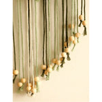décoration murale macramé feuilles vertes bohème nature barre bois suspension triangles