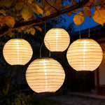 lanternes solaires extérieures blanc rayures horizontales moderne anneau métallique éclairage jardin