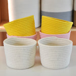 paniers rangement tissés motifs géométriques blanc rose violet beige jaune modernes réutilisables respectueux environnement