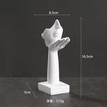 statuettes décoratives visage humain noir blanc doré modernes minimalistes abstraites contemporaines base carrée livres