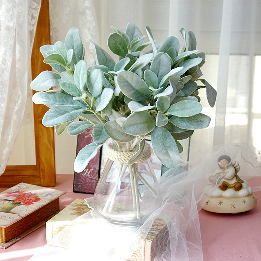bouquet artificiel feuilles ovales vert clair gris rustique naturel vase transparent emballage brun serviette