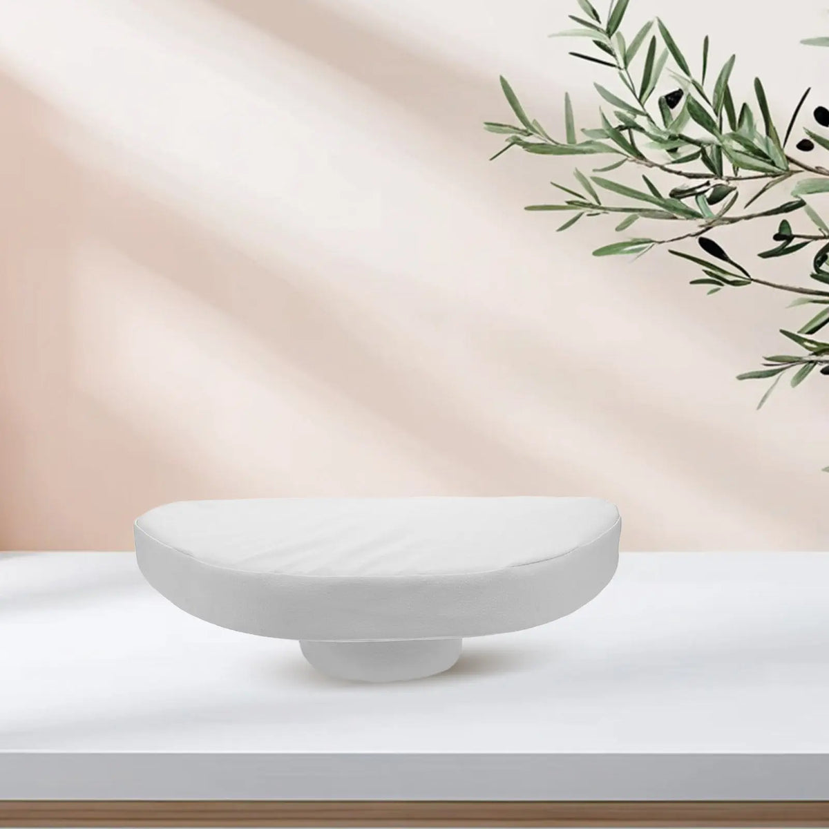 coussin massage tête blanc texture lisse moderne fixe face down relaxation spa salon