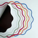 serviettes table multicolores moderne rayures ondulées respectueuses l'environnement rouges blanches bleues vertes jaunes