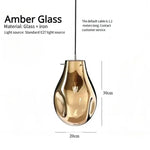 Suspension lumineuse moderne verre transparent doré bleu ampoules filament minimaliste