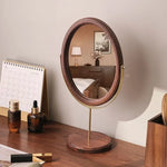 miroir cosmétique classique bois marron foncé pied central ornement décoration chambre erotique