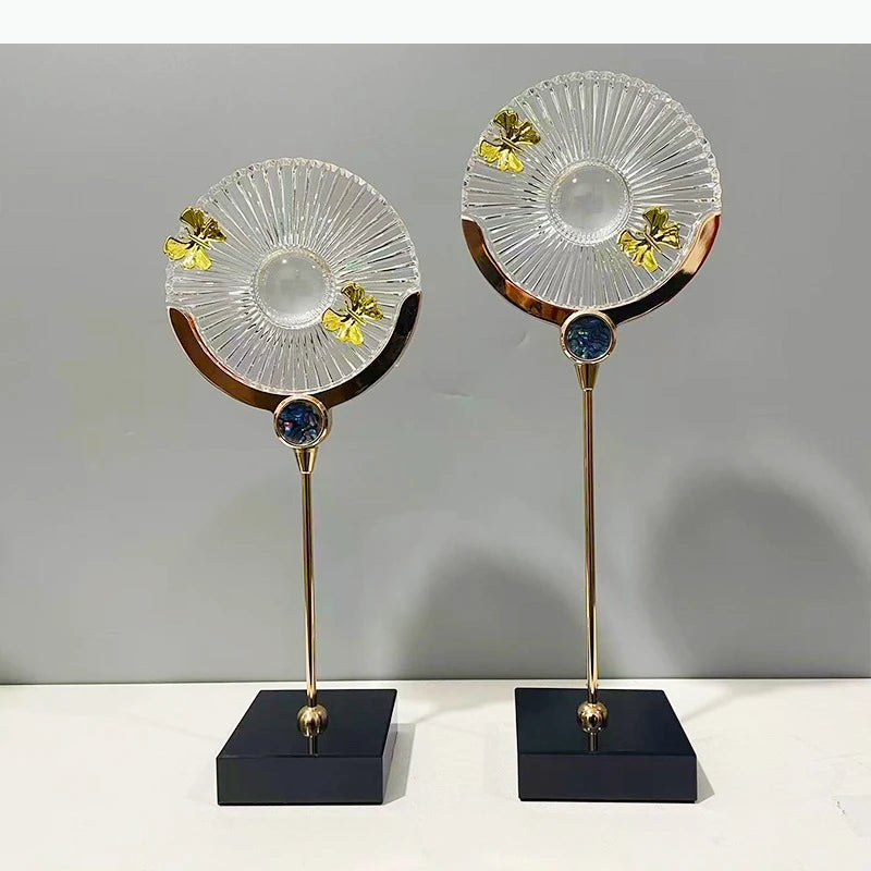 Bougeoir moderne transparent doré papillons bleu rayures base carrée noire tige dorée