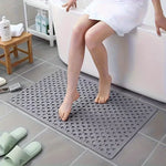 tapis bain douche gris vert perforations anti dérapage moderne salle bain ventilation trous ronds