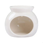 diffuseur parfum bougie chauffe parfum moderne minimaliste bleu clair rose jaune vert blanc rouge