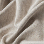 Texture élégante d'un textile beige aux plis délicats, parfait pour la décoration intérieure et le design moderne. Idéal pour apporter une touche de sophistication et de douceur à votre espace de vie.