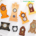 horloges décoratives vintage ornées motifs floraux couleur orange noir marron doré