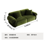 canapé vert olive moderne tissu uni bois coussins décoratifs sectionnel français minimaliste
