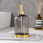 distributeur savon liquide transparent texturé moderne élégant noir bleu rose jaune pompe base dorée