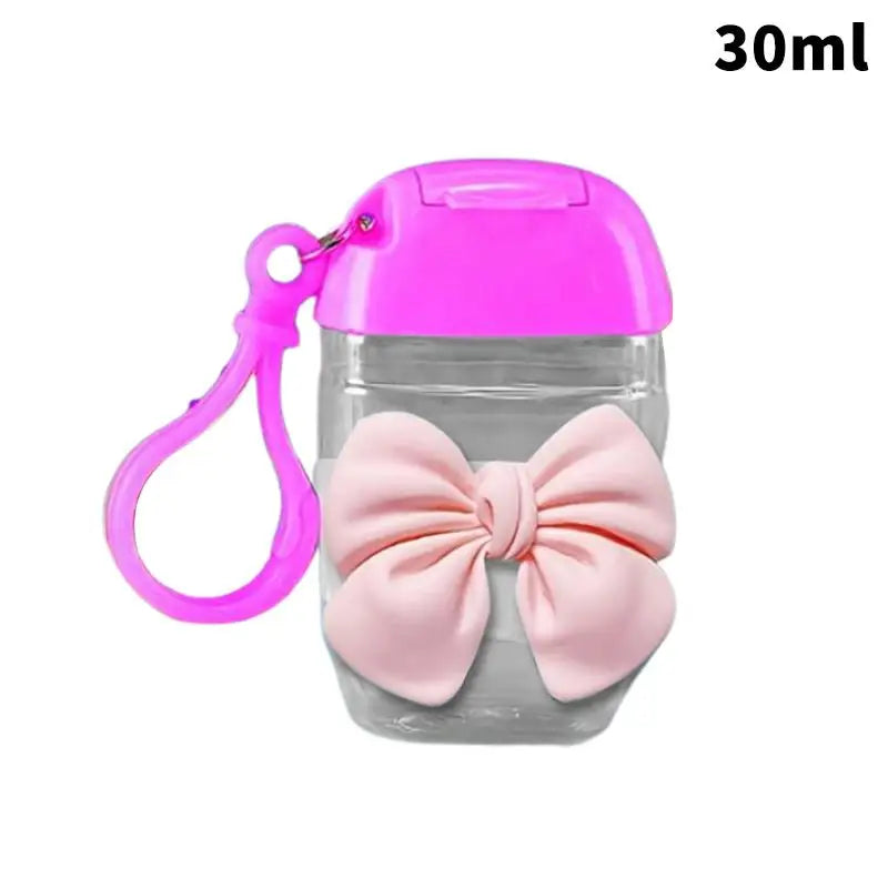 flacon gel hydroalcoolique transparent rose ruban noeud clip moderne rechargeableextérieur