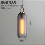 suspension lumineuse moderne gris fumé doré verre mat métal poli ampoule filament visible chambre