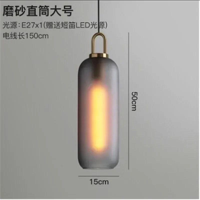suspension lumineuse moderne gris fumé doré verre mat métal poli ampoule filament visible chambre