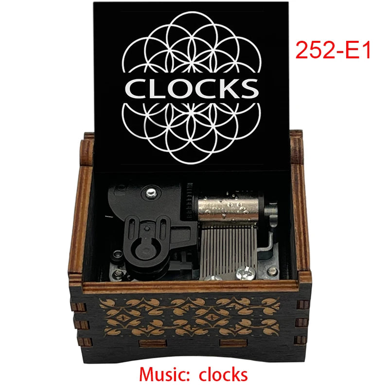 boîte musicale bois naturel motifs floraux 18 tons vintage manivelle horlogerie artisanale