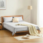 fixations antiderapantes draps housses couettes maison blanc gris modernes minimalistes visibles plastique