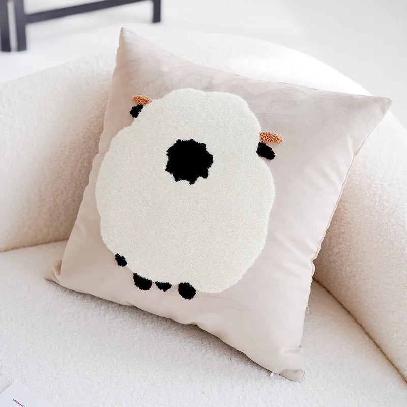 Coussin décoratif moelleux avec un motif mignon de chien blanc et noir sur fond blanc.