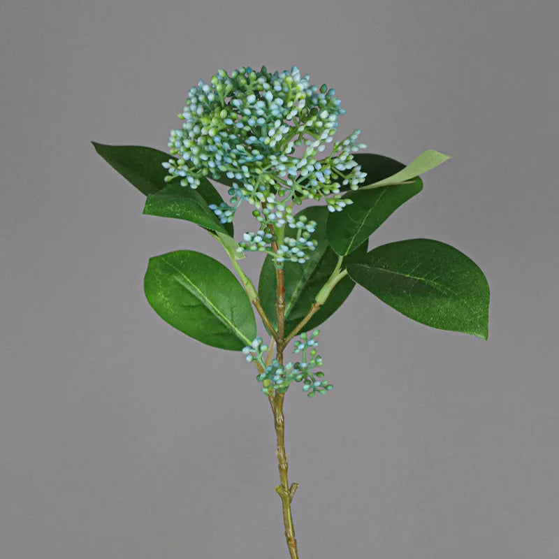 bouquet artificiel feuilles vertes fleurs blanches bleues naturel extérieur arrangement anniversaire