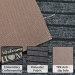 tapis d'entrée noir rayures horizontales broderie dorée moderne antidérapant