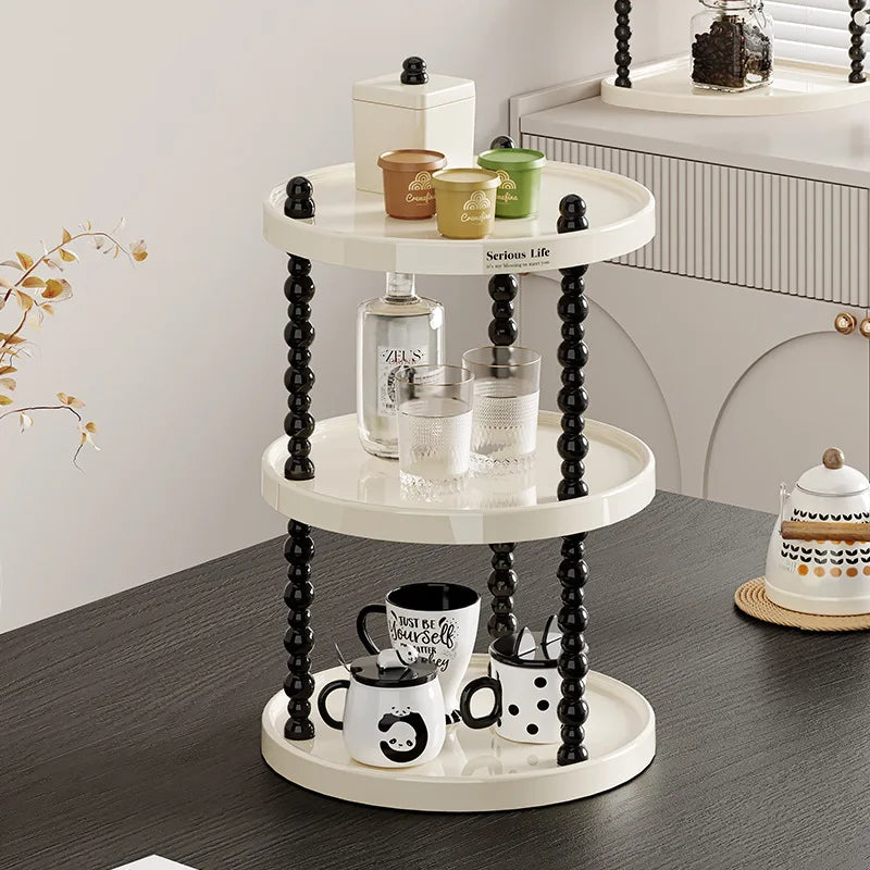 étagère trois niveaux moderne minimaliste blanc noir cosmétiques parfums tasses blancs