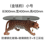 table basse moderne léopard rose vif orange noir verre opaque pieds solides animalier