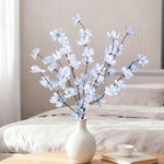décoration intérieure bouquet fleurs artificielles rose naturel blanc orange rouge bleu vase minimaliste