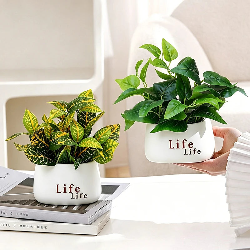 plantes artificielles vertes moderne pots blancs décoration intérieure feuilles variées minimaliste