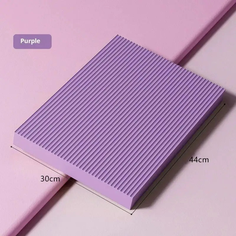 tapis d'équilibre antidérapant mousse haute résilience violet noir yoga abdos genoux moderne minimaliste