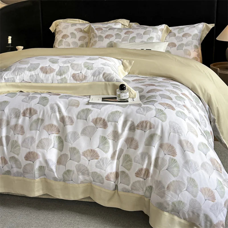 ensemble literie quatre pièces housse couette drap taies fleurs motifs élégants tissu lyocell