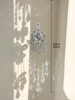 décoration jardin boho hamsa cristal prismes bleu argent transparent lumière capturante