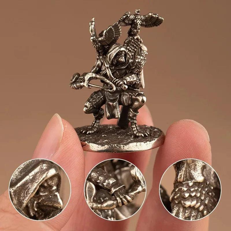 figurine bronze oiseau arc chasseur médiéval fantastique décoration intérieure sculpteur detalles