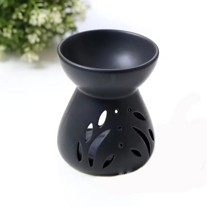 lampe huile essentielle céramique moderne noir blanc décoration feuilles étoiles ajourée diffuseur aromathérapie yoga