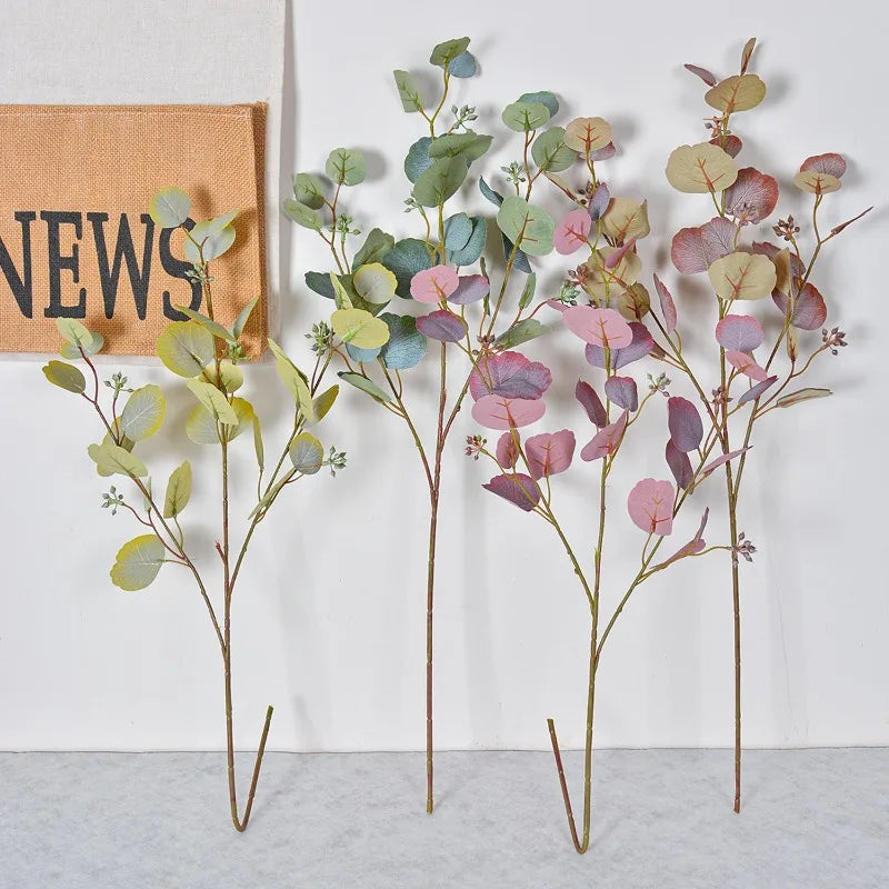 décoration intérieure branche artificielle feuilles ovales vert rose naturel minimaliste