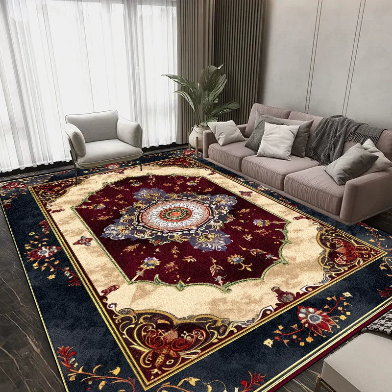 L'image montre un salon élégant avec un canapé gris, des rideaux blancs et un magnifique tapis persan aux motifs floraux colorés qui couvre le sol.
