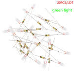 néon glow lampe led ampoule verte résistances marron rouge or électronique composants transparents filés