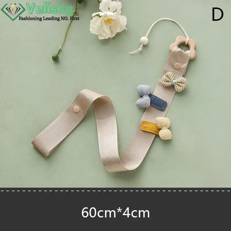 porte accessoires mural moderne rubans clips cheveux motifs floraux pois arc ciel nuages papillons