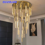 suspension lumineuse contemporaine or argent texture brillante élégante chambre salle bain led