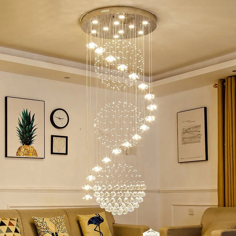 Suspension lumineuse moderne cristal transparente salon chambre étude 2000 82000 flux lumineux