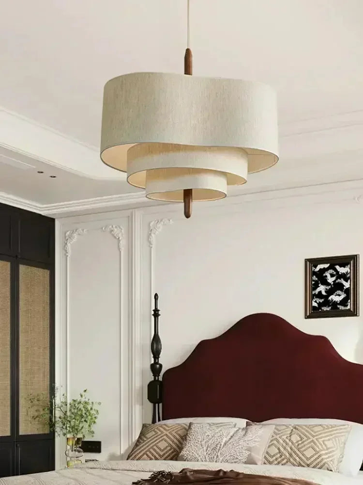 suspension lumineuse tissu beige clair moderne salon lumière led fer chaîne métallique