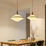 Lampe plafond LED beige éteinte montrant son design épuré