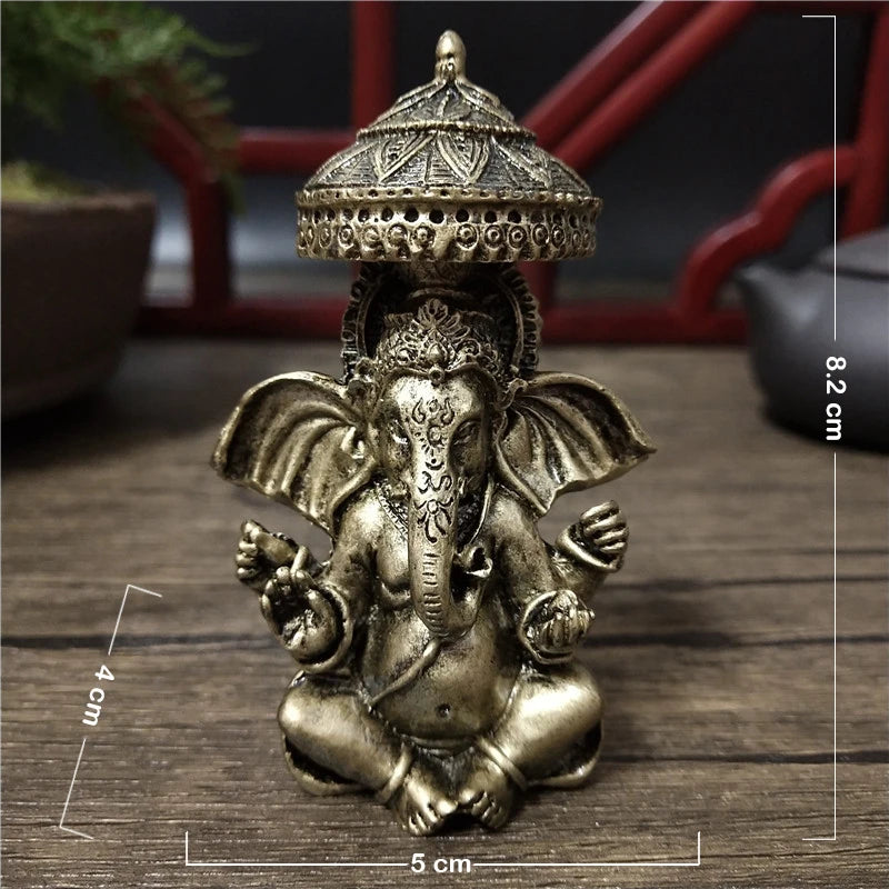 statue ganesha dorée résine ornements complexes décoration intérieure artisanale traditionnelle bouddhiste éléphant multiple bras