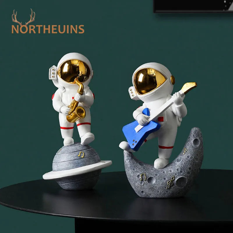 statue astronaute résine saxophone doré guitare violoncelle moderne décoration intérieure chambre salon