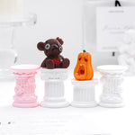 décoration maison colonnes architecturales rose blanche bougie ours peluche citrouille